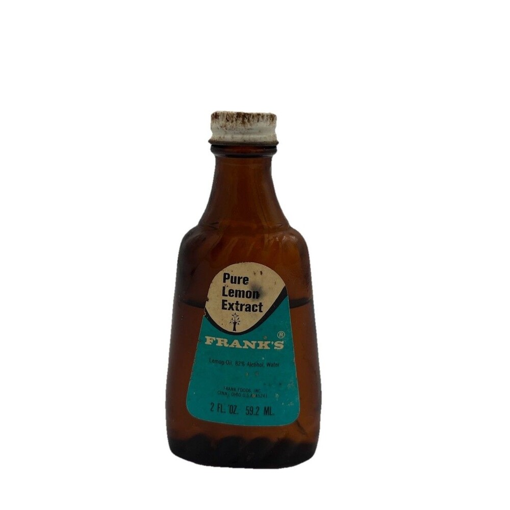 Vintage Frank’s Pure Lemon Extract Amber Bottle 2Fl oz Almost Full Trinket VTG